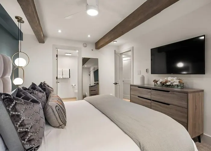 Fully Renovated 2 Bedroom On River With Pool - Walk To Town!